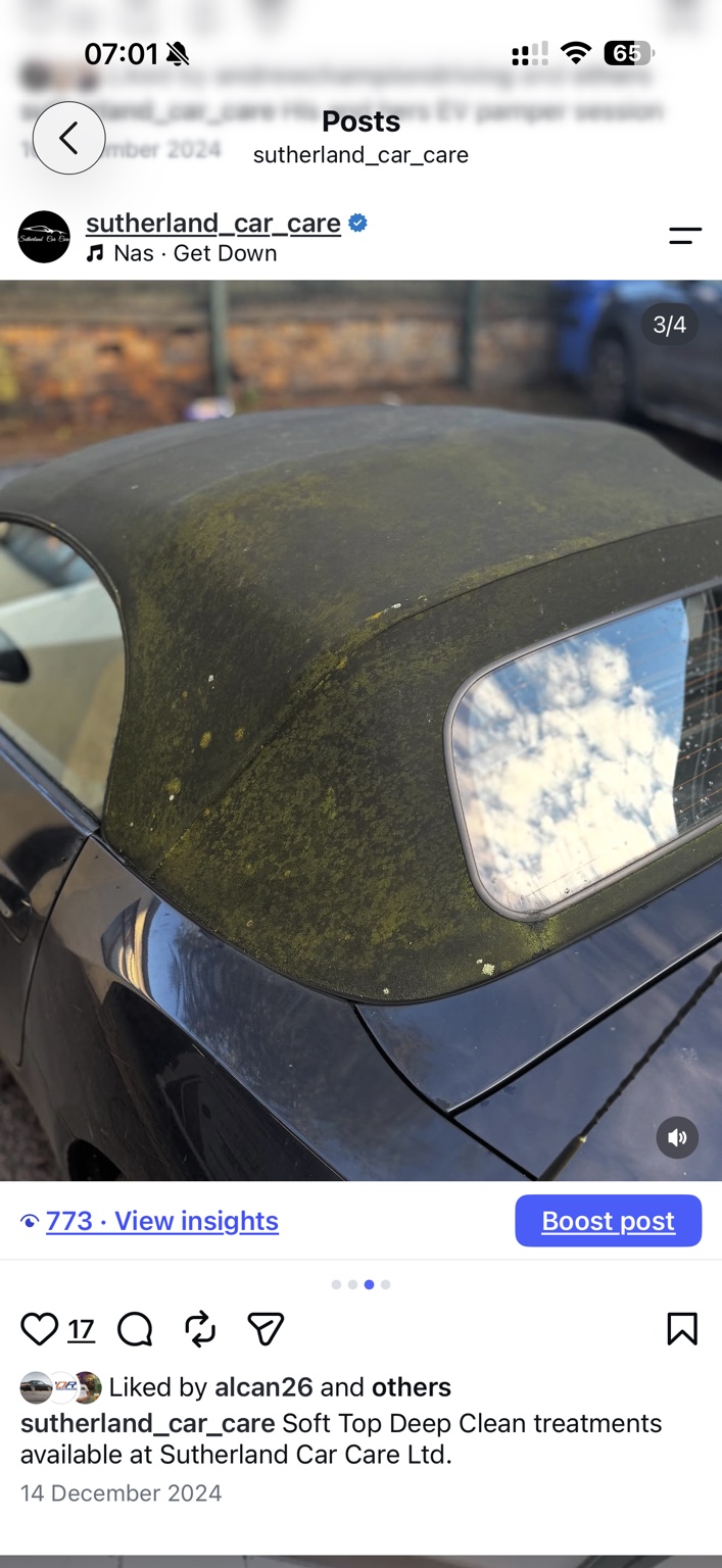 Before deep cleaning: green growth and grime cover the convertible fabric roof.